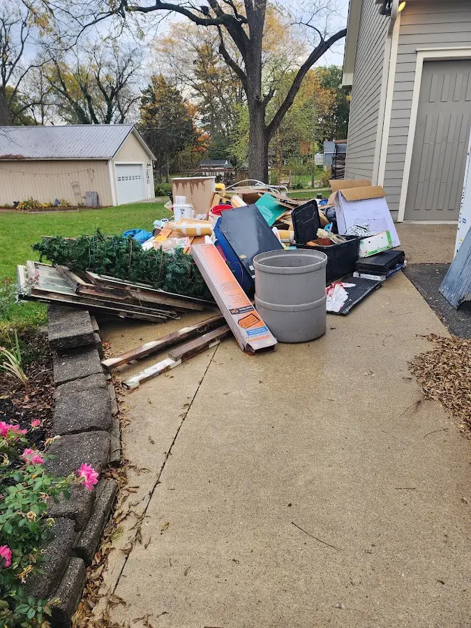 Dumpster being loaded with debris for 30 Yard Dumpster Rental in Boyes Hot Springs